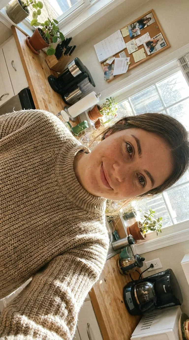 Generated photo of a woman in a knit sweater in a kitchen